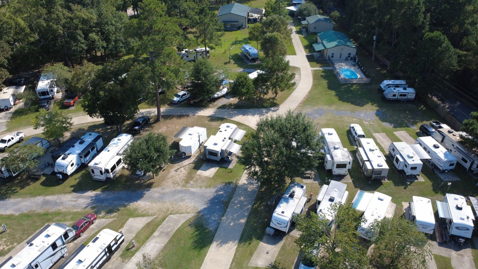 Aerial photo of RV sites along the park road at Red Cloud RV Park, Silsbee Texas