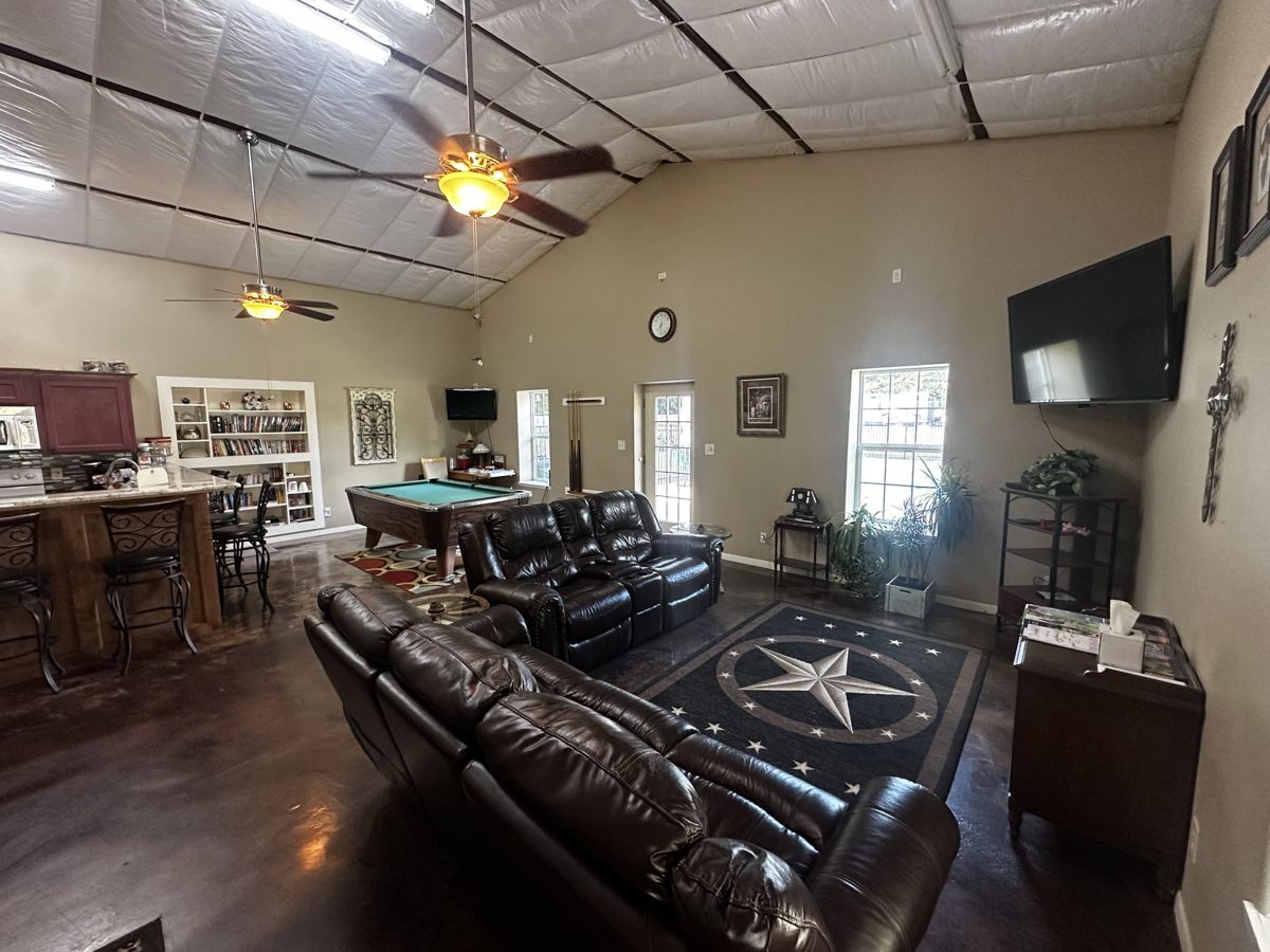 Clubhouse seating area with TV at Red Cloud RV Park