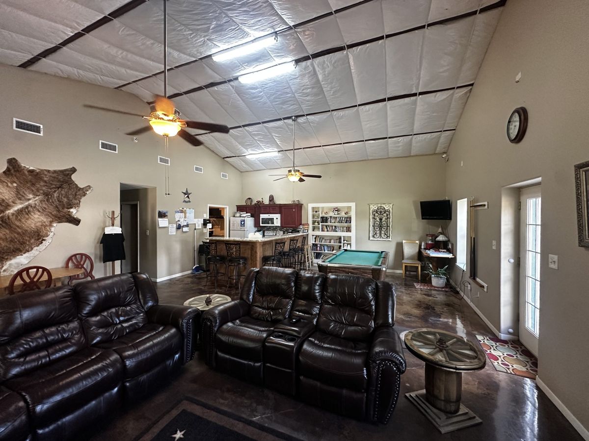 Clubhouse lounge with leather recliners at Red Cloud RV Park